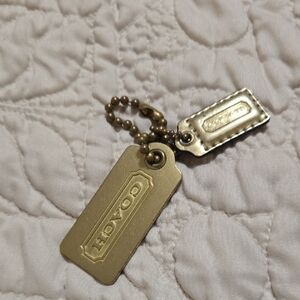 Coach Gold and Metallic  gold Tag Keychain